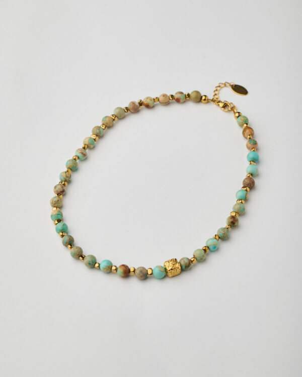 Full handmade turquoise necklace with 24k gold cube and gold spacers by The Gem Stories
