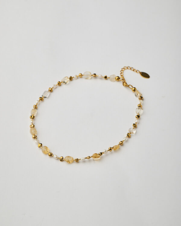 Full view of handmade citrine and pearl necklace with 24k gold plated details