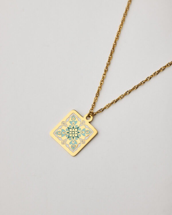 Handmade gold stainless steel necklace with mandala-style enamel pendant