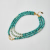 Full handmade necklace with marble aquamarine howlite beads and three-strand design