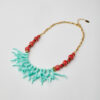 Handmade necklace with turquoise coral charms and red beads