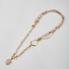 Full handmade necklace with rose quartz pendant, shell chips, and multistrand tourmaline beads