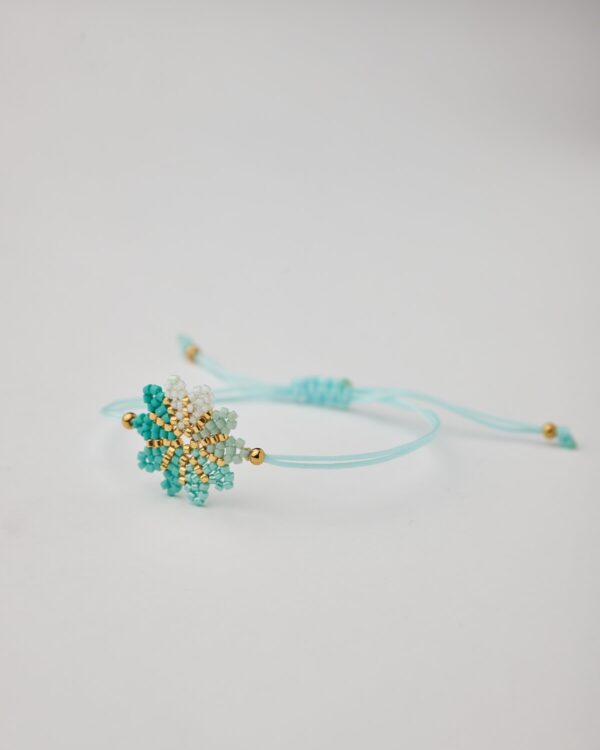 Handmade bracelet with turquoise-white-gold Miyuki flower on adjustable cord