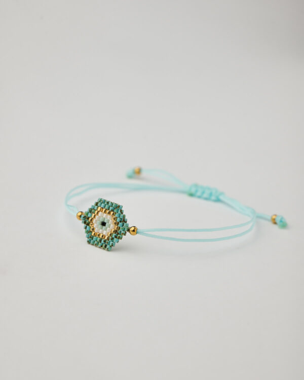 Full handmade bracelet with turquoise and gold Miyuki beads and blue cord