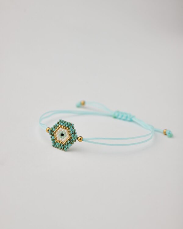 Full handmade bracelet with turquoise and gold Miyuki beads and blue cord