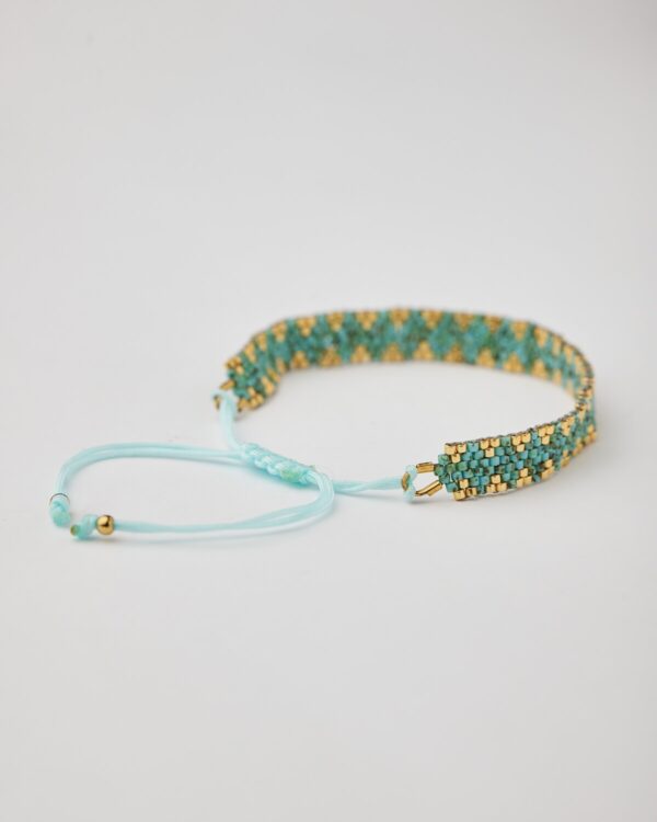 Handmade bracelet with turquoise and gold Miyuki beads and adjustable macramé closure