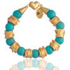 Handmade turquoise howlite bracelet with gold-plated twisted spacers and heart clasp by The Gem Stories
