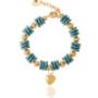 Pastel emerald bracelet with ripple beads, gold accents, and a heart charm on a white background