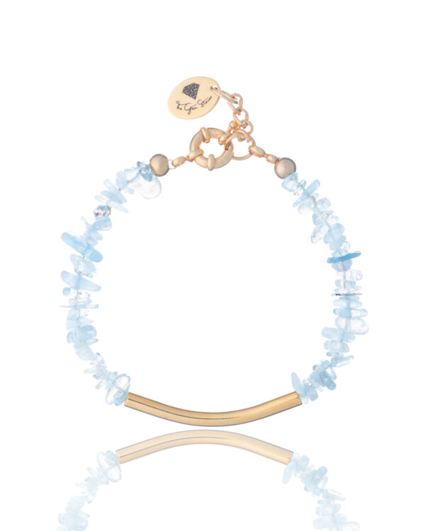 Handmade aquamarine bracelet with gold-plated curved element by The Gem Stories