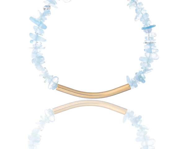 Handmade aquamarine bracelet with gold-plated curved element by The Gem Stories