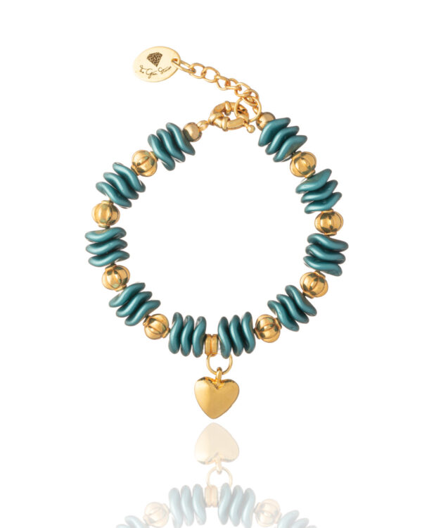 Pastel emerald bracelet with ripple beads, gold accents, and a heart charm on a white background
