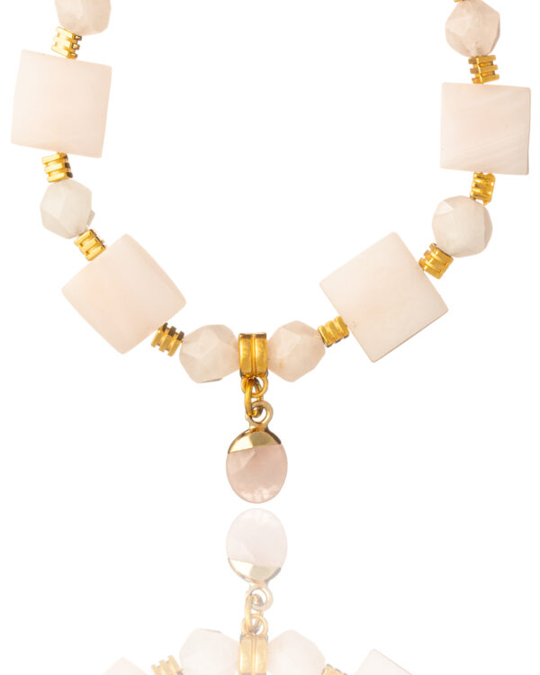 Handmade blush rose quartz bracelet with gold-plated elements by The Gem Stories