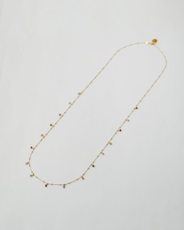 Long gold chain necklace with multicolor gemstone charms by The Gem Stories