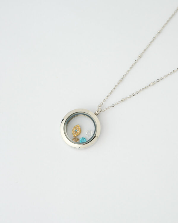 Blue and Gold Eye Memory Locket Necklace by The Gem Stories