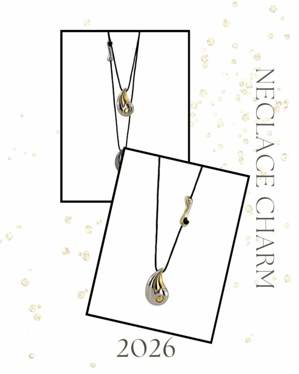 Gold Drop Necklace Charm by The Gem Stories – handmade pendant with gold and silver tones on black cord.