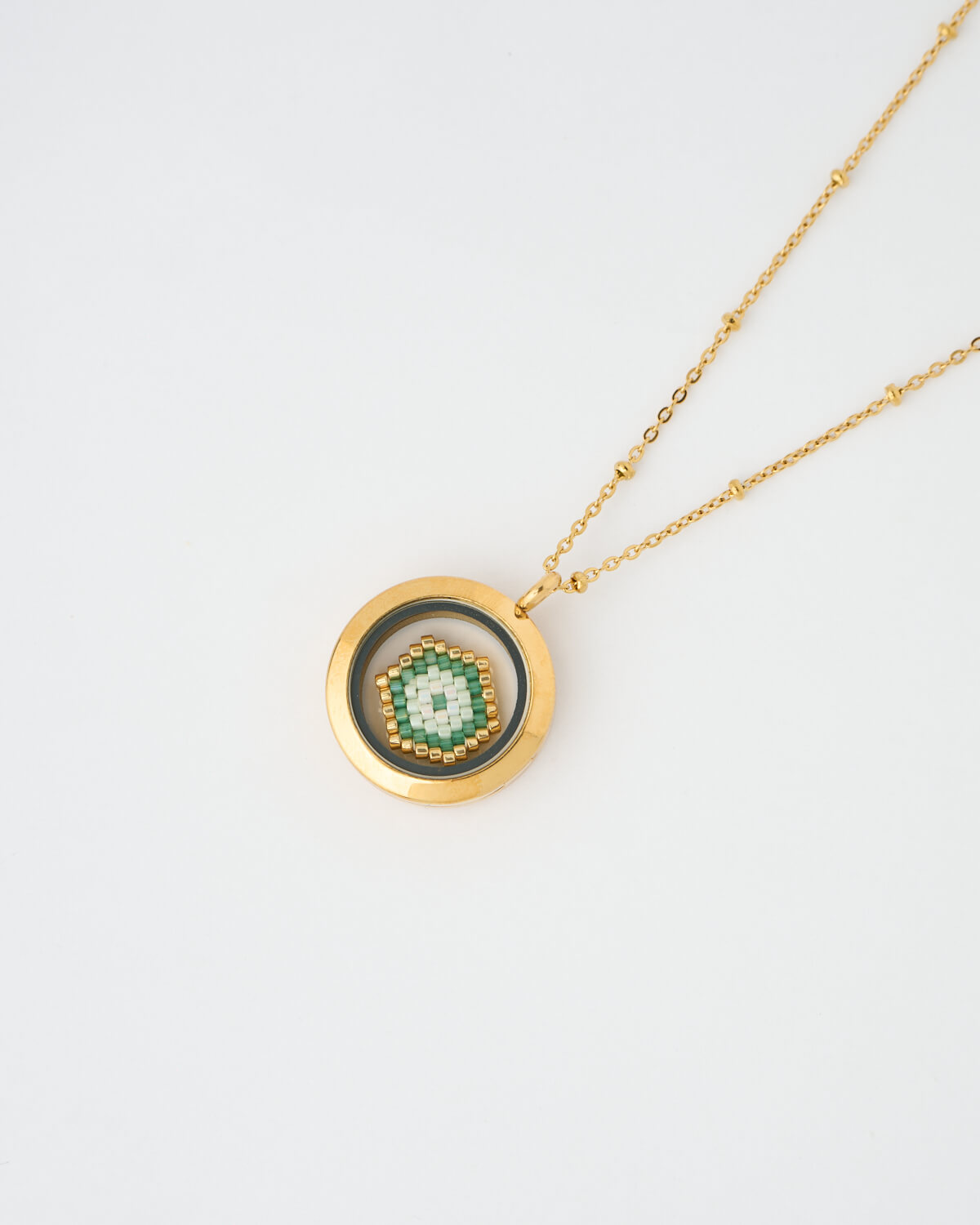 Golden Green Evil Eye Miyuki Memory Locket Necklace Golden Green Evil Eye Miyuki Memory Locket Necklace by The Gem Stories