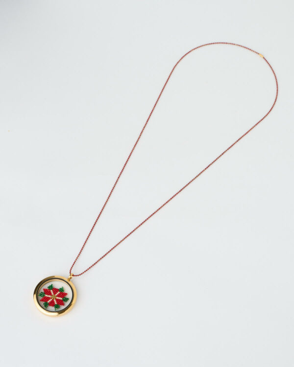 Poinsettia Miyuki memory locket necklace by The Gem Stories