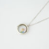 Silver sun and colorful stones memory locket necklace by The Gem Stories