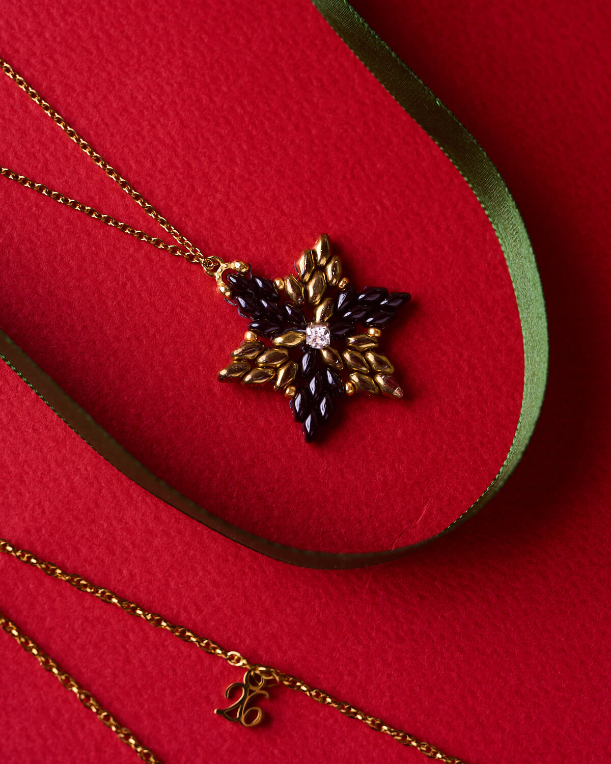 The-gem-stories-black-gold-star-pendant-2026 XMAS Black and Gold Star necklace with 70cm chain by The Gem Stories