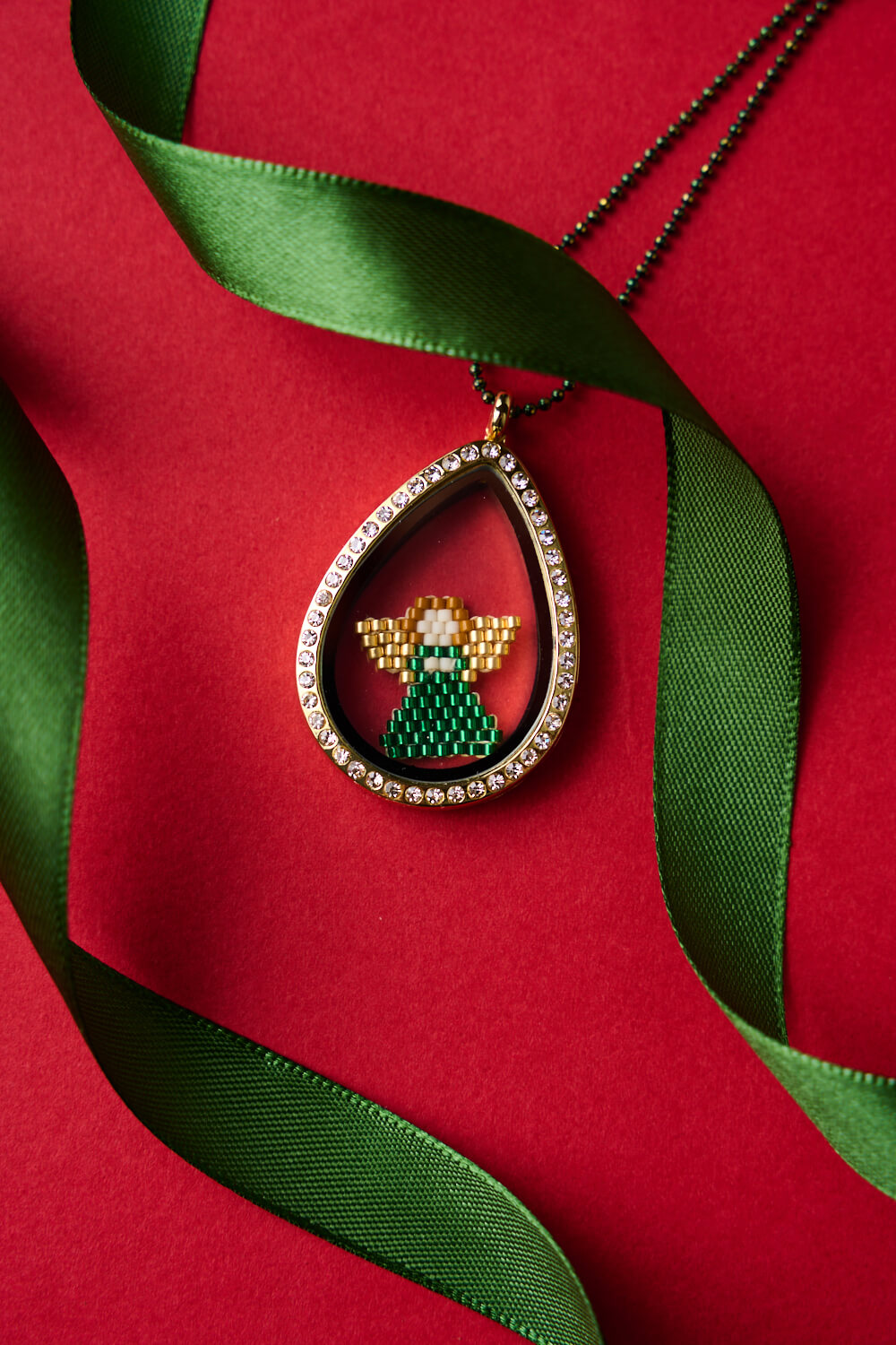 The-gem-stories-Green-angel-locket-necklace