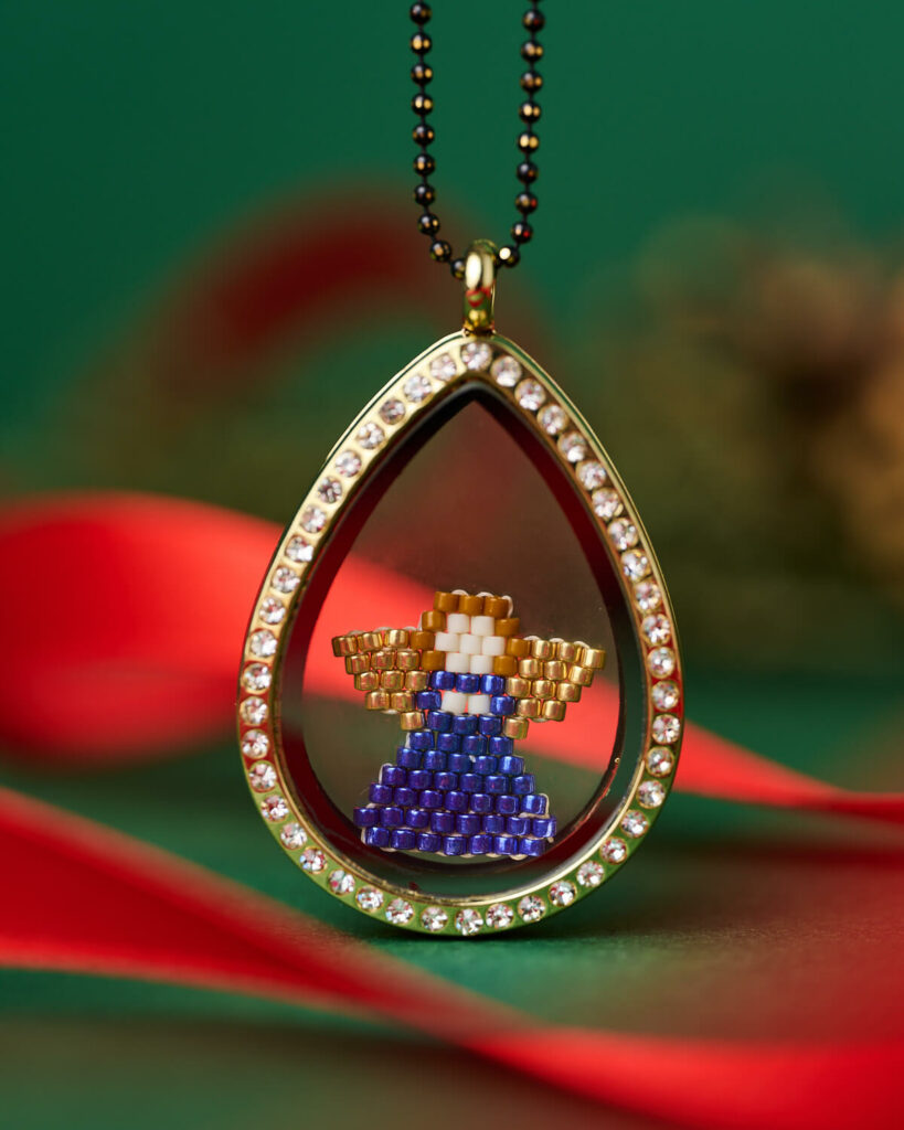 Christmas Blue Angel Miyuki Drop Locket Necklace with crystal-studded teardrop frame by The Gem Stories