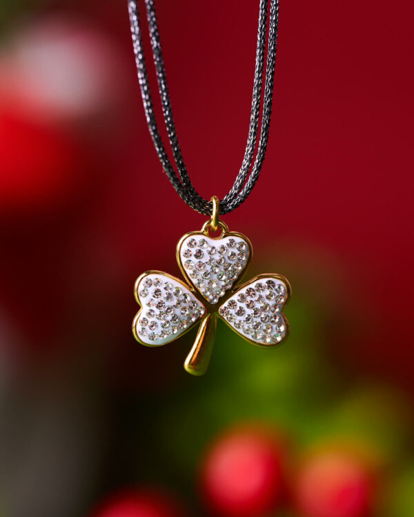 Black Crystal Clover Charm pendant with sparkling stones by The Gem Stories