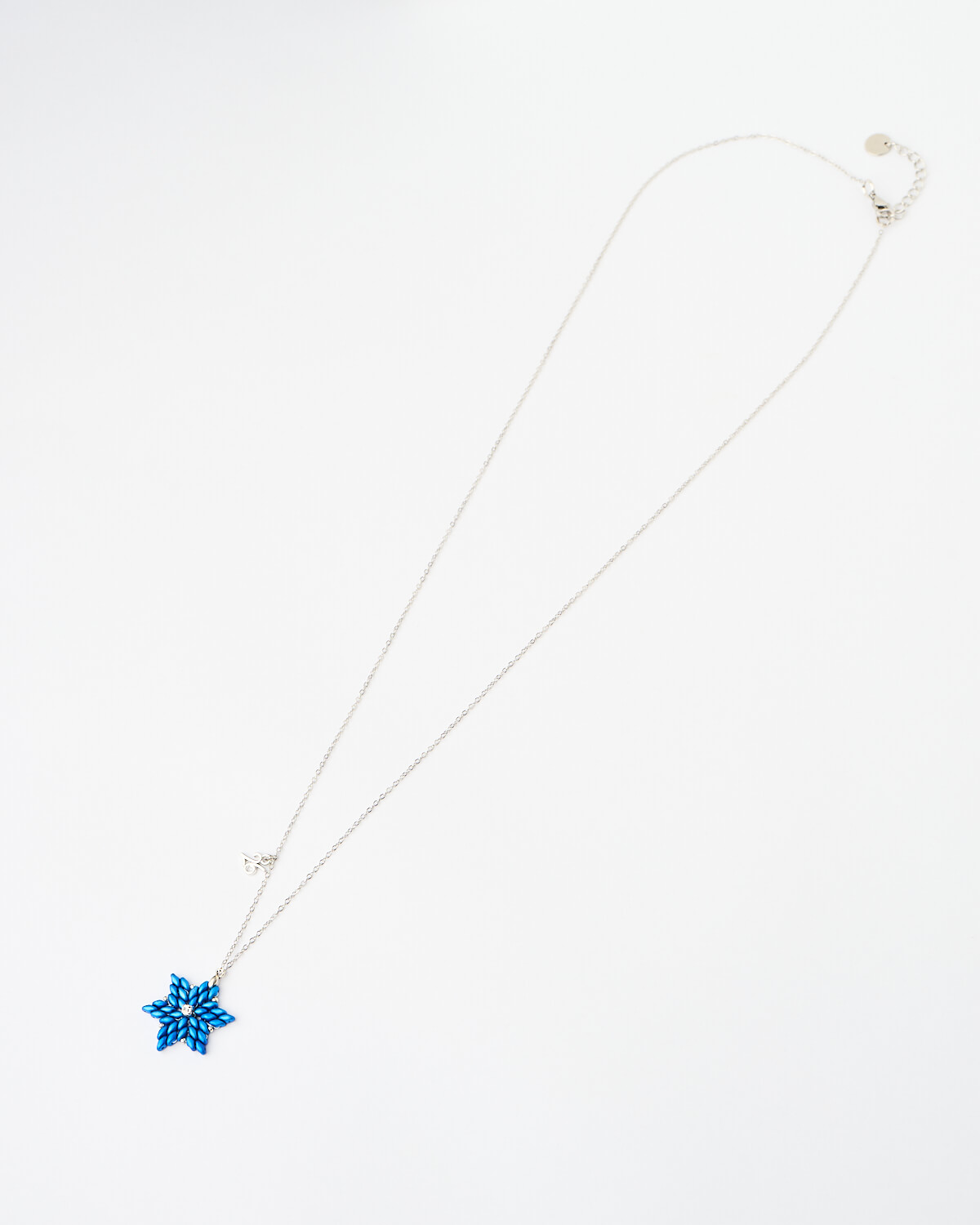 The-Gem-Stories-Blue-Snowflake-Miyuki-Necklace Blue Snowflake Miyuki Necklace with handcrafted beaded snowflake pendant by The Gem Stories