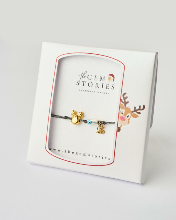 Reindeer Evil Eye Bracelet in black presented in festive gift box with gold charms by The Gem Stories