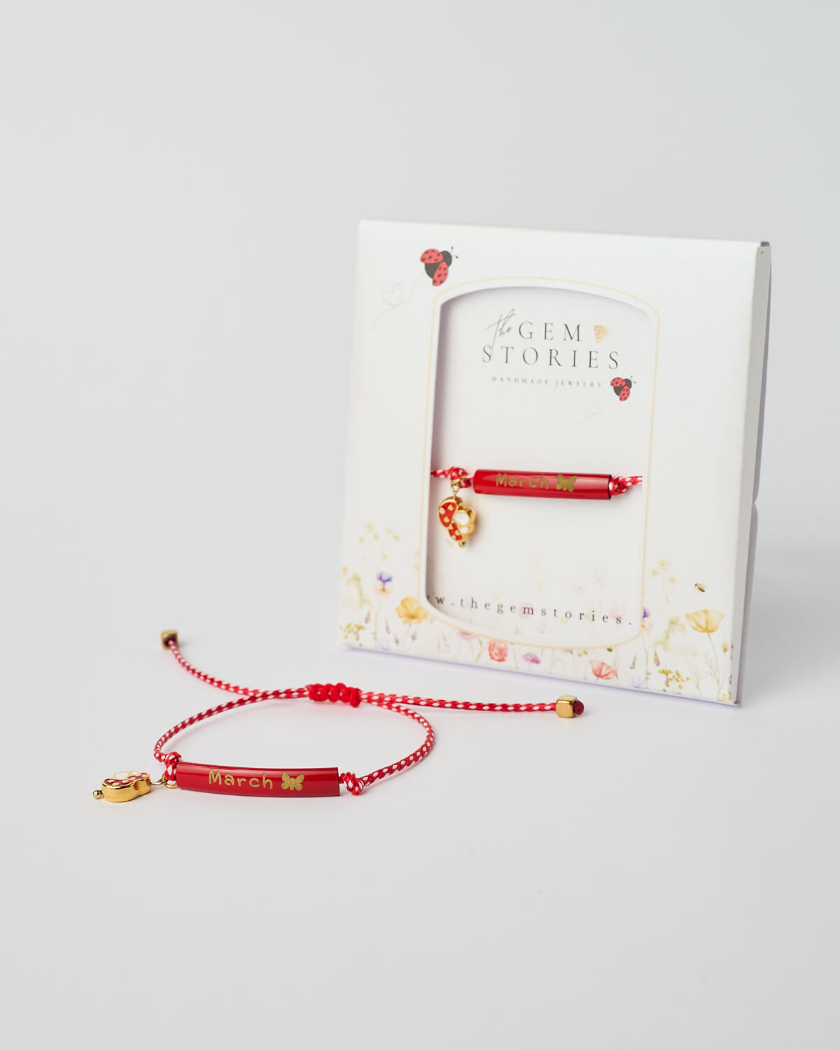 The-Gem-Stories-March-Red-Bar-Bracelet March red bar handmade bracelet with gold elements and adjustable macramé knot by The Gem Stories
