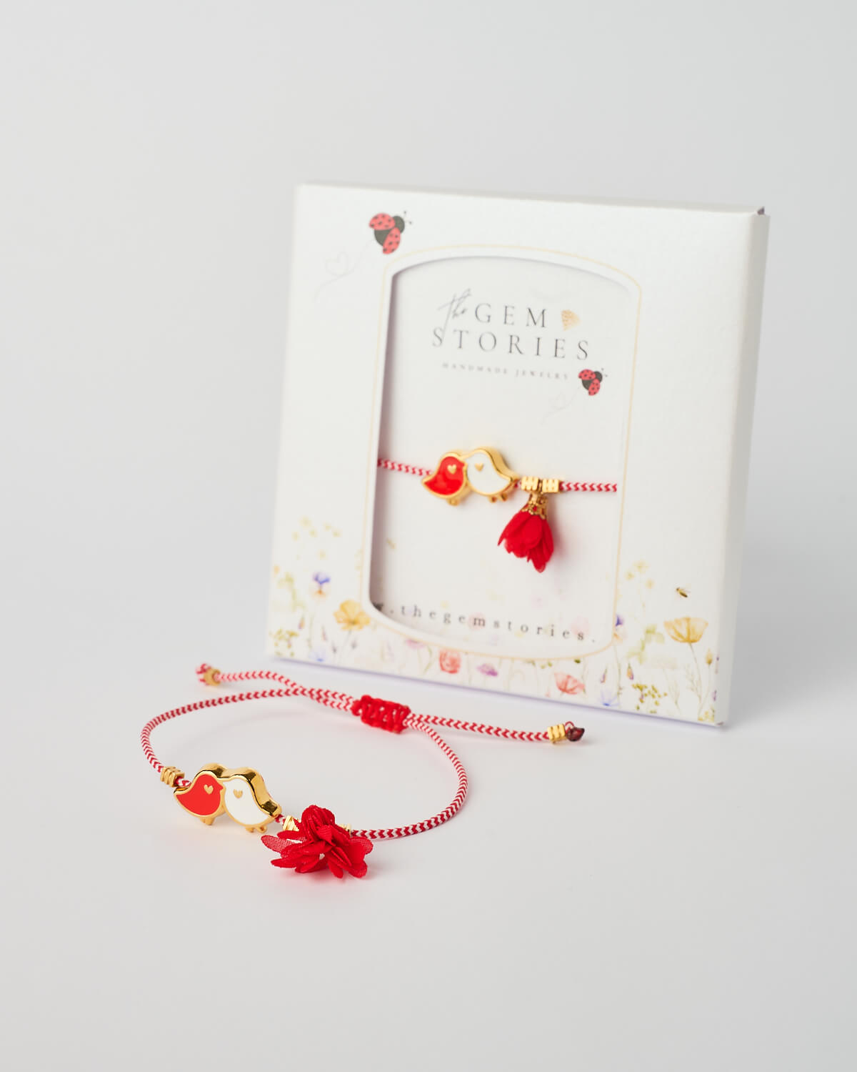 March Macrame Love Birds Bracelet – Handmade Romantic Jewelry March macrame love birds bracelet with red tassel and gold details