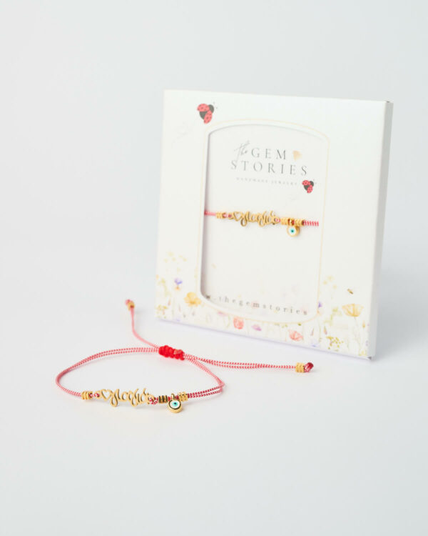 Κόκκινο βραχιόλι Grandmother Love Martaki με συμβολικό χρυσό γούρι από το The Gem Stories