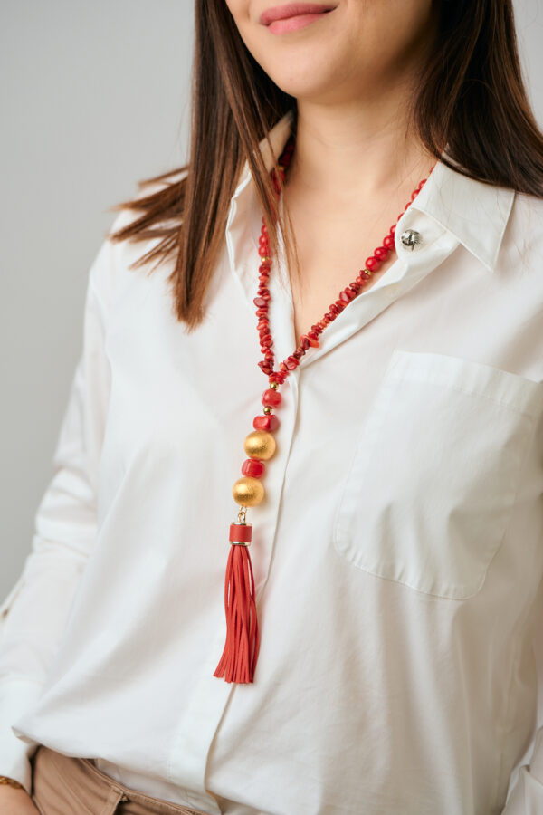 Model wearing Red Coral Gold tassel necklace by The Gem Stories
