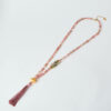 Rose Serenity necklace with soft pink beads and tassel detail by The Gem Stories