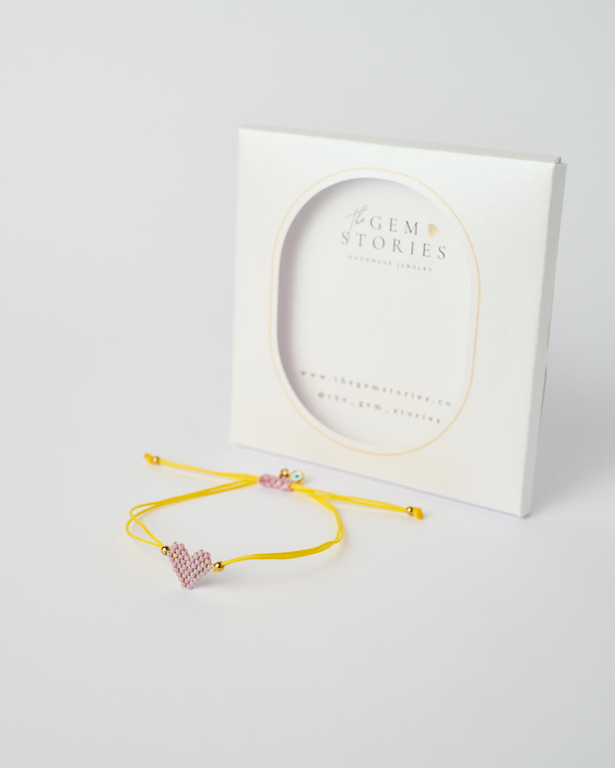 Βραχιόλι Miyuki με γούρι καρδιά – Λιλά-Κίτρινο Βραχιόλι Miyuki με καρδιά λιλά-κίτρινο, χειροποίητο βραχιόλι με χάντρες και χρυσές λεπτομέρειες, από το The Gem Stories