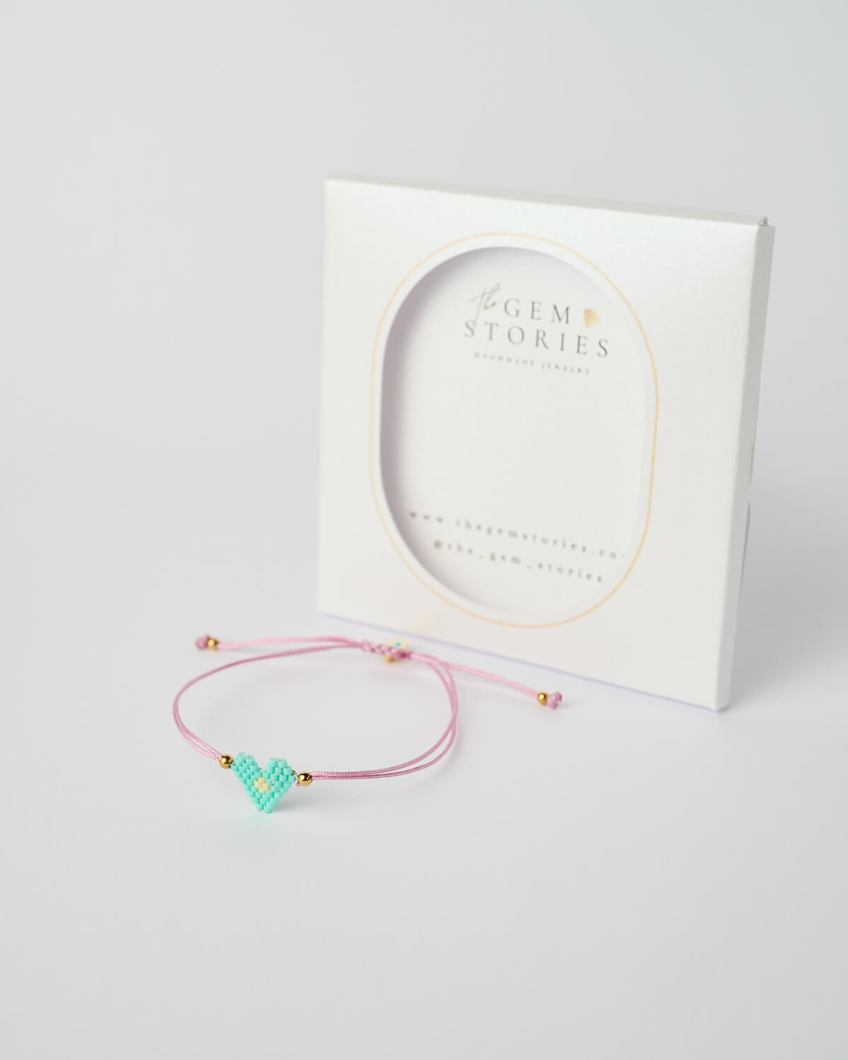 Βραχιόλι Miyuki με γούρι καρδιά – Μέντα-Λιλά Βραχιόλι Miyuki με καρδιά σε απόχρωση μέντας, σε λιλά ρυθμιζόμενο κορδόνι με χρυσές λεπτομέρειες