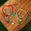 Colorful Miyuki heart bracelets handmade with beaded hearts by The Gem Stories