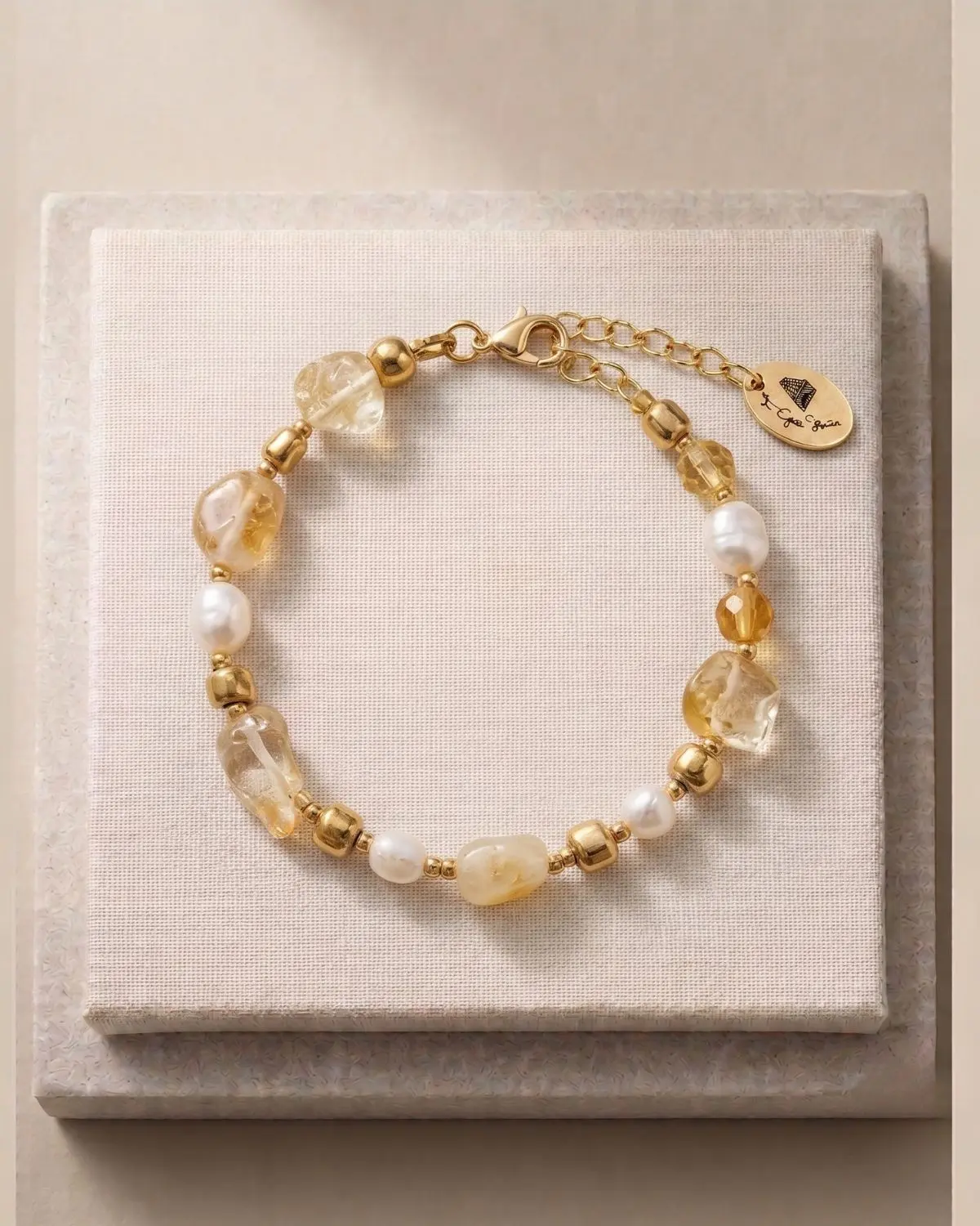 Citrine & Pearl Bracelet concept Handmade Citrine & Pearl Bracelet Concept featuring radiant citrine gemstones and elegant pearls in a refined design.