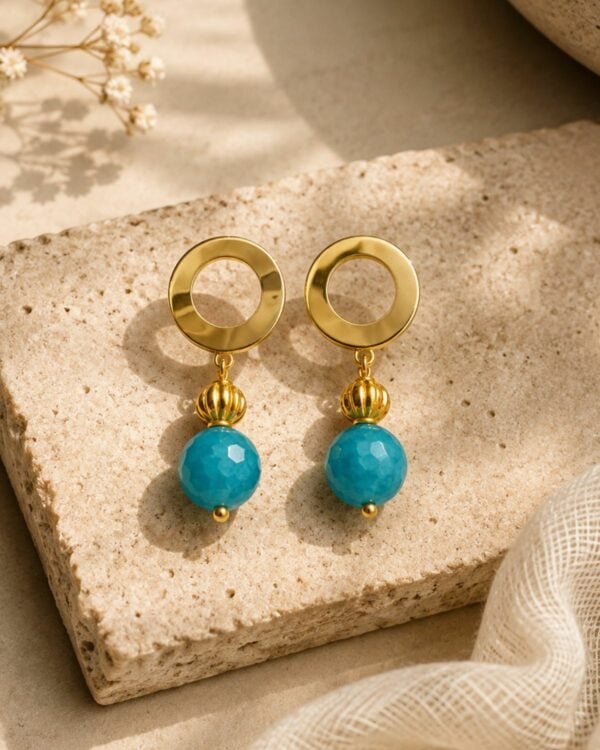 The Gem Stories Eclipse Turquoise Earrings featuring elegant turquoise details in a sophisticated handcrafted design.