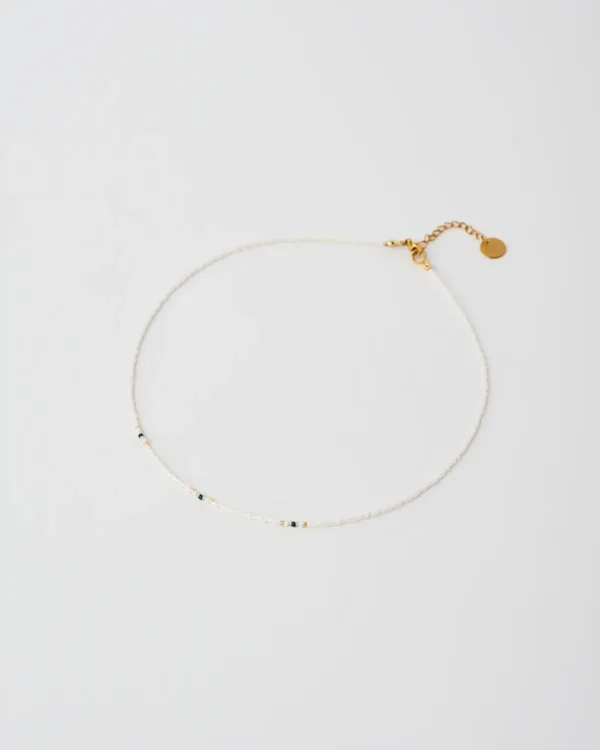 Minimal handmade Miyuki beaded black and white necklace by The Gem Stories
