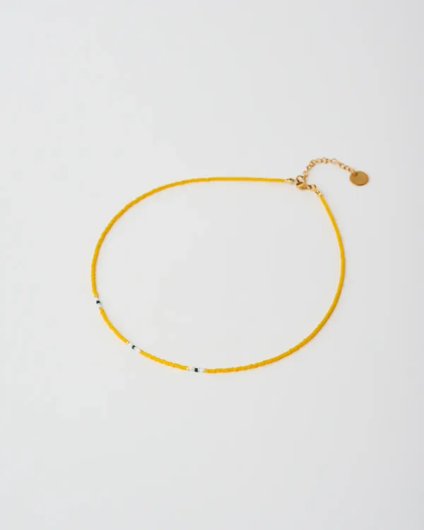 Minimal handmade Miyuki beaded yellow necklace by The Gem Stories