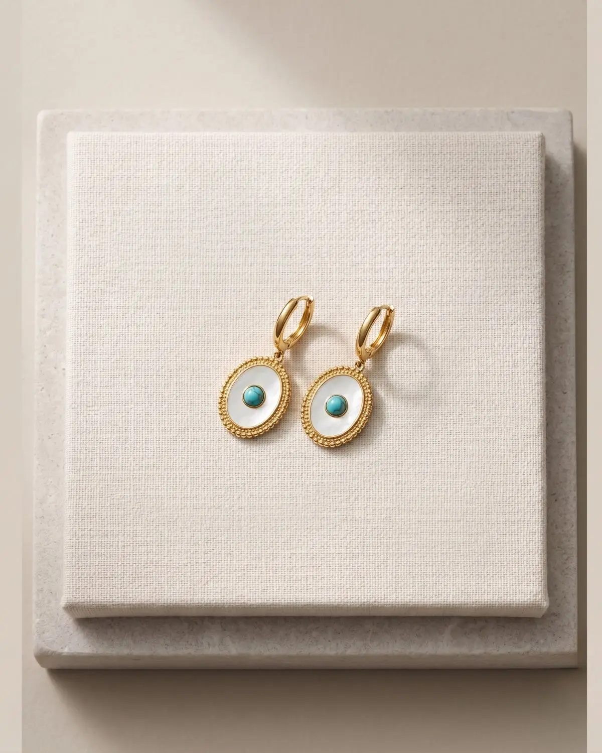 Turquoise White Oval Gold Earrings concept2 Handmade Turquoise White Oval Gold Earrings Concept 2 featuring elegant turquoise details, white oval accents, and refined gold elements.