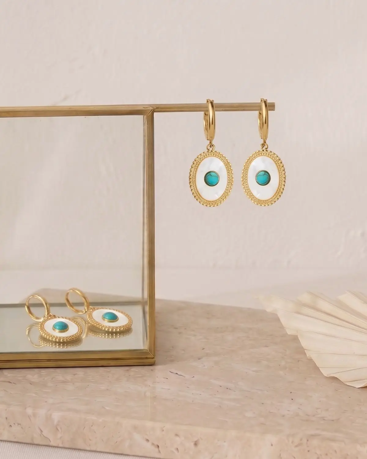Turquoise White Oval Gold Earrings concept Handmade Turquoise White Oval Gold Earrings Concept featuring turquoise accents, white oval elements, and elegant gold details.