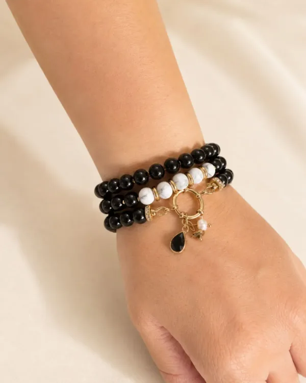 Close-up of handmade multilayer black and white marble bracelet by The Gem Stories