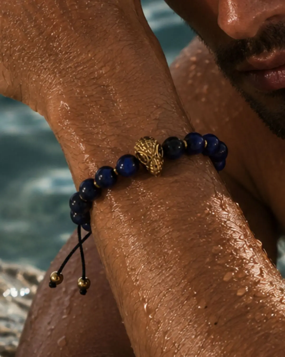 Lapis Lazuli Stone Bracelet with Gold Spider-Man concept Handmade Lapis Lazuli Stone Bracelet Concept featuring deep blue lapis lazuli beads and a gold Spider-Man-inspired centerpiece.