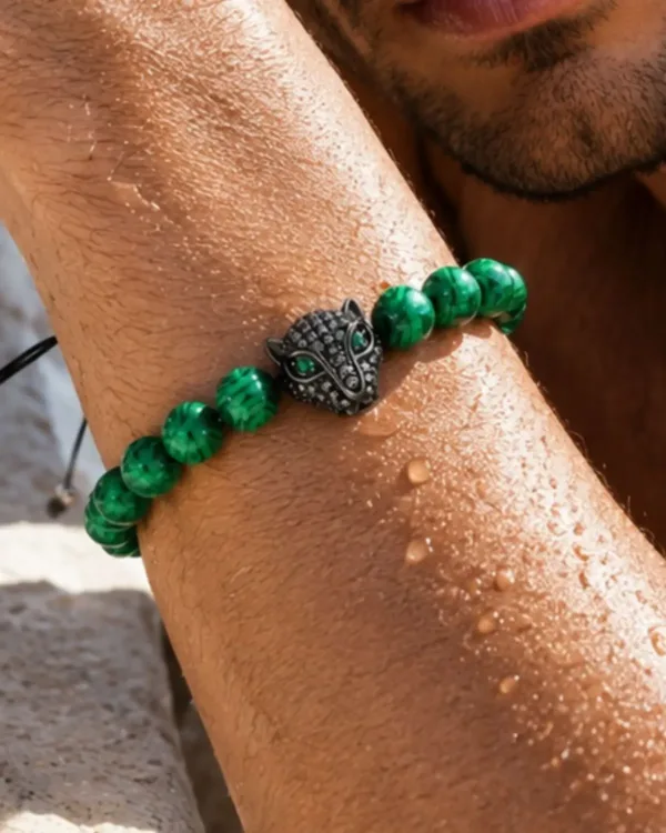 Handmade Malachite Panther Beaded Bracelet Concept featuring green malachite-inspired beads and a bold panther design.