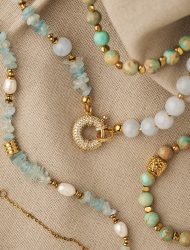 Aquamarine turquoise and pearl beaded necklaces with gold details handmade by The Gem Stories